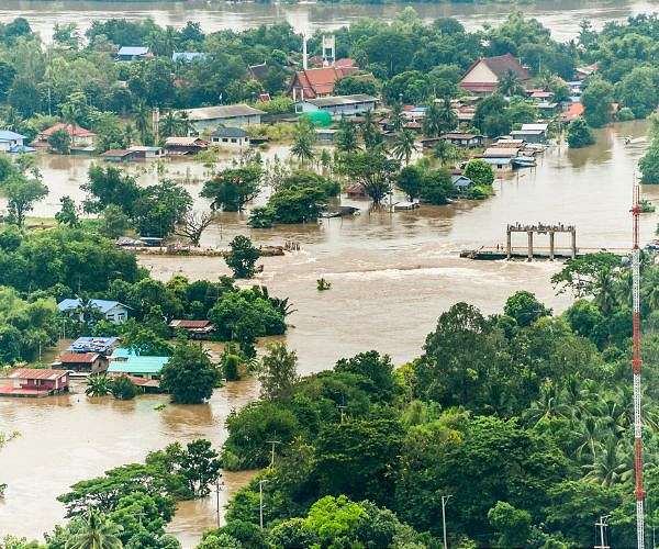Thailand floods kill 13, leaving people stranded and roads submerged