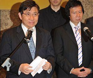 H.K. tycoon brothers in graft probe deny wrongdoing