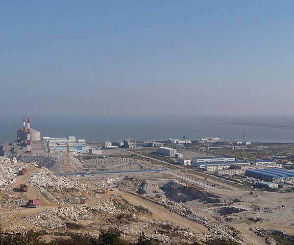 Putin, Xi hail ties at launch of work on nuclear plants in China