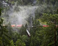 Swiss train carriage plunges into ravine after landslide