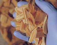 Machine makes wood chips a coal substitute