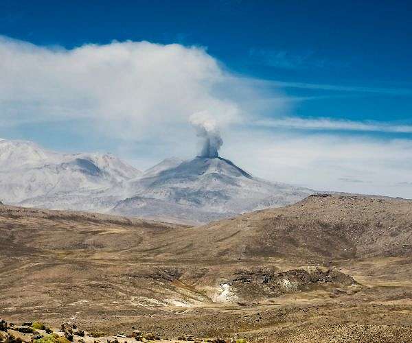 Peru volcano rumbles to life, spews ash on towns