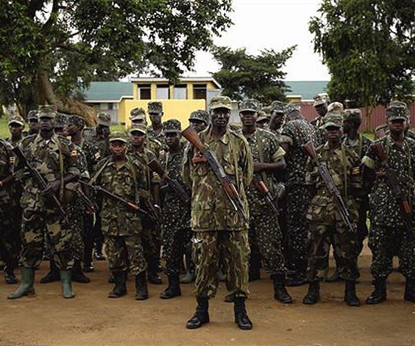 Uganda charges three with terrorism over foiled funeral attack