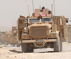 British forces hand over flashpoint Afghan district to US
