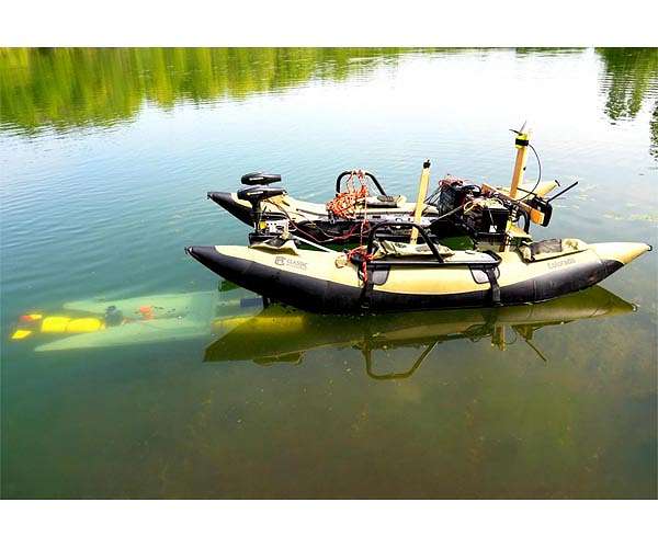 Underwater robots to autonomously dock mid-mission to recharge and transfer data