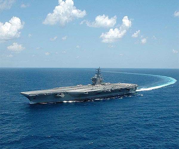 Eisenhower carrier strike group conducts port visit in Oman
