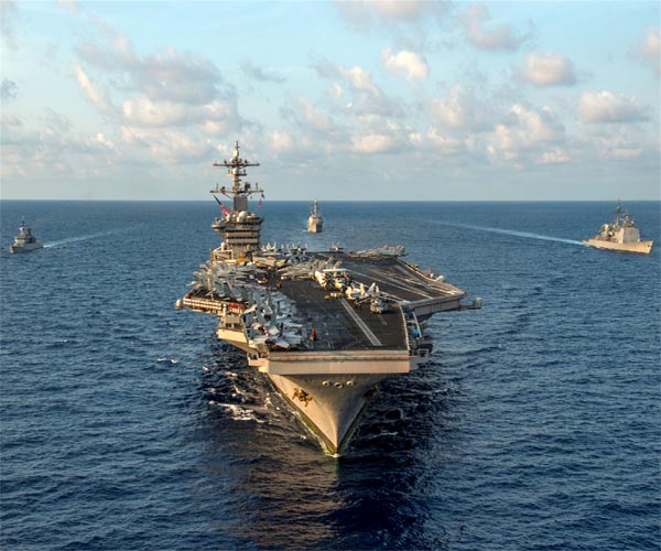 US positions carrier, bombers to back Afghanistan pullout
