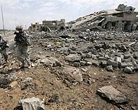 Iraqi cabinet approves US pact amid lingering violence