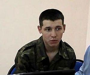 Kazakh guard accused of killing 15 goes on trial