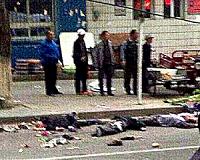 Military drill staged as China market attack toll rises